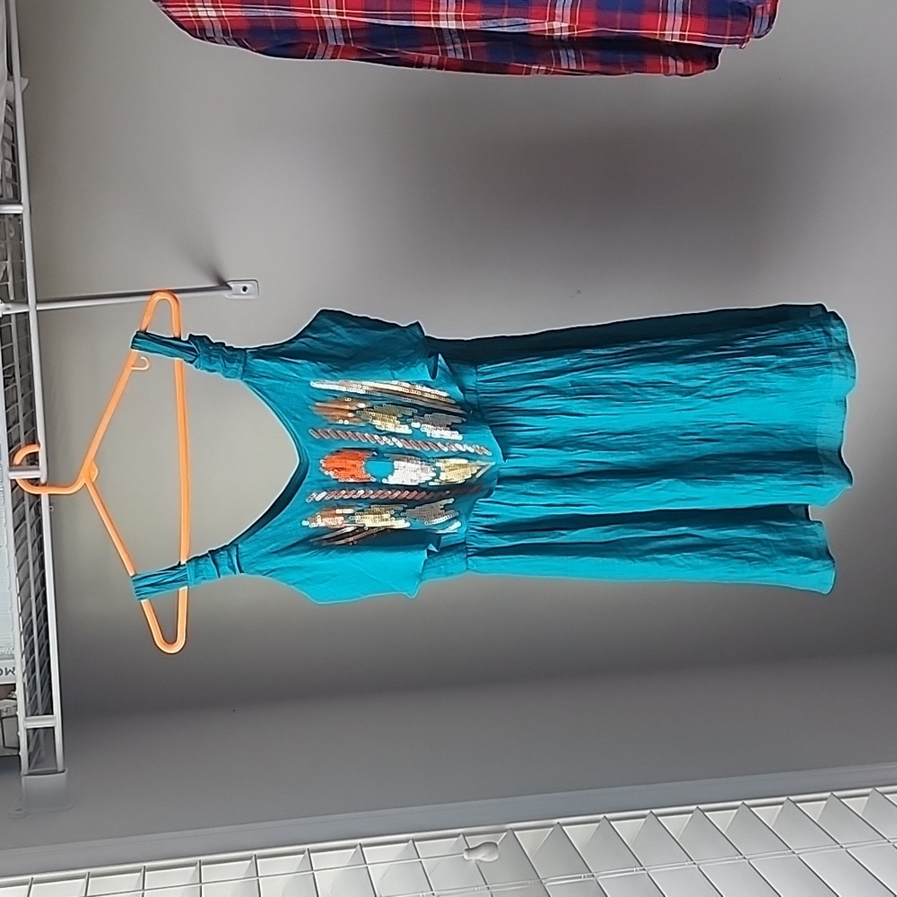 Small, turquoise dress with sequins by I.N. layered dress